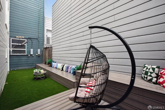 a view of stairs yard from a balcony