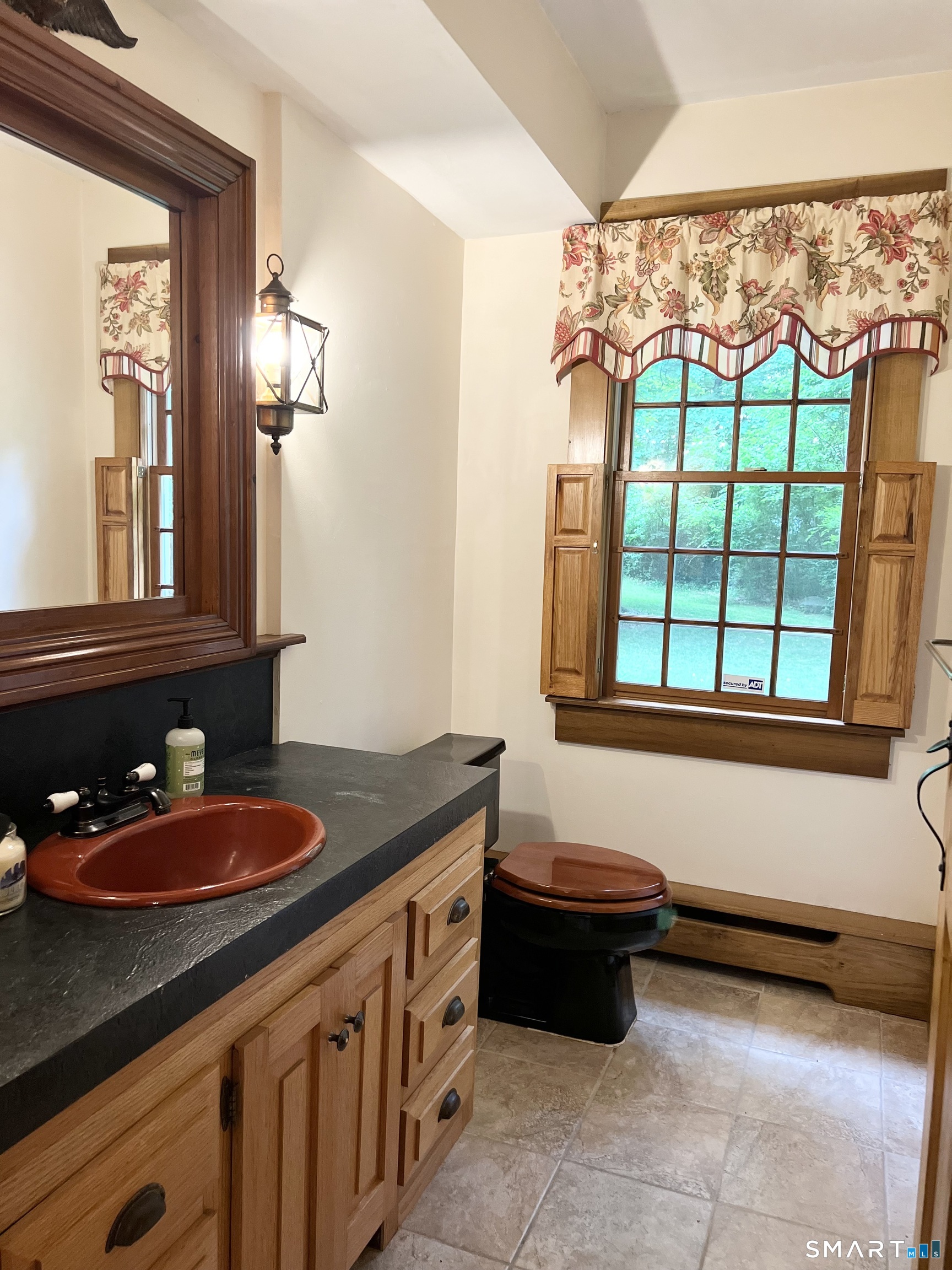 38 Clark Hill Road East Haddam, CT 06423 - Photo 26 of 35 a bathroom with a granite countertop sink and a large mirror