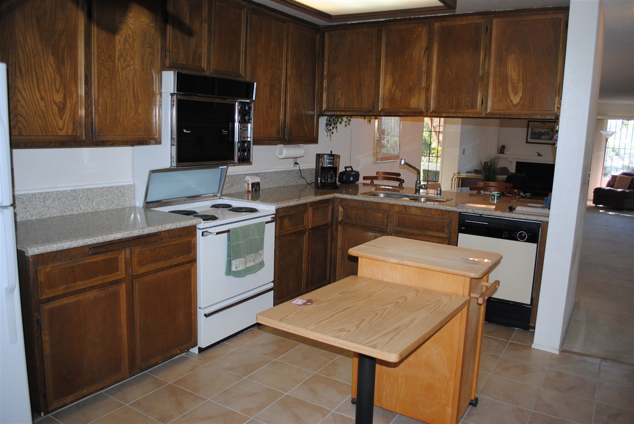 6343 Rancho Mission Road, Unit 2 San Diego, CA 92108 - Photo 12 of 24 View fro Kitchen entrance from back patio.