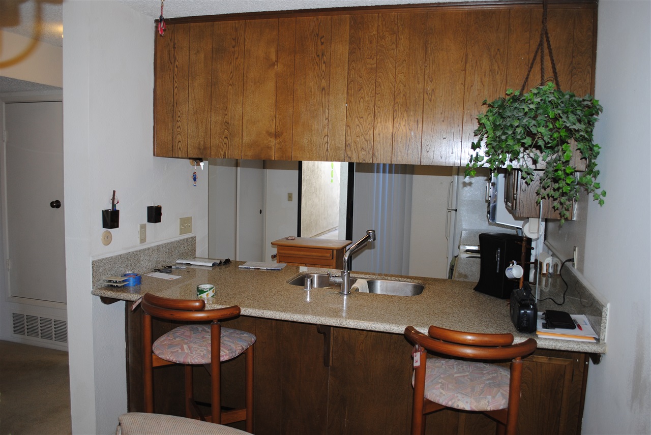 6343 Rancho Mission Road, Unit 2 San Diego, CA 92108 - Photo 16 of 24 Bar Stools, sitting area.