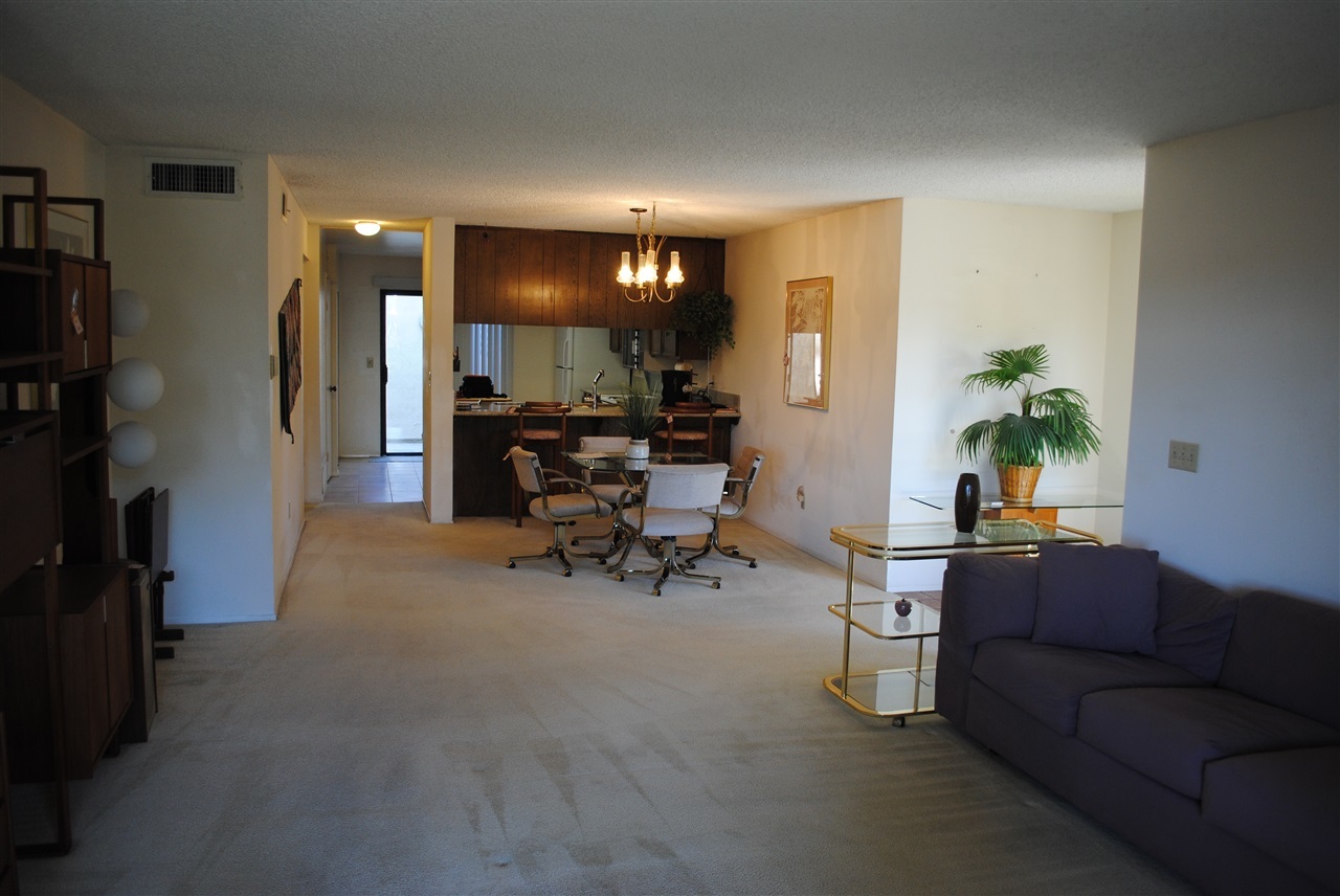 6343 Rancho Mission Road, Unit 2 San Diego, CA 92108 - Photo 3 of 24 View from living room to dining area and kitchen.