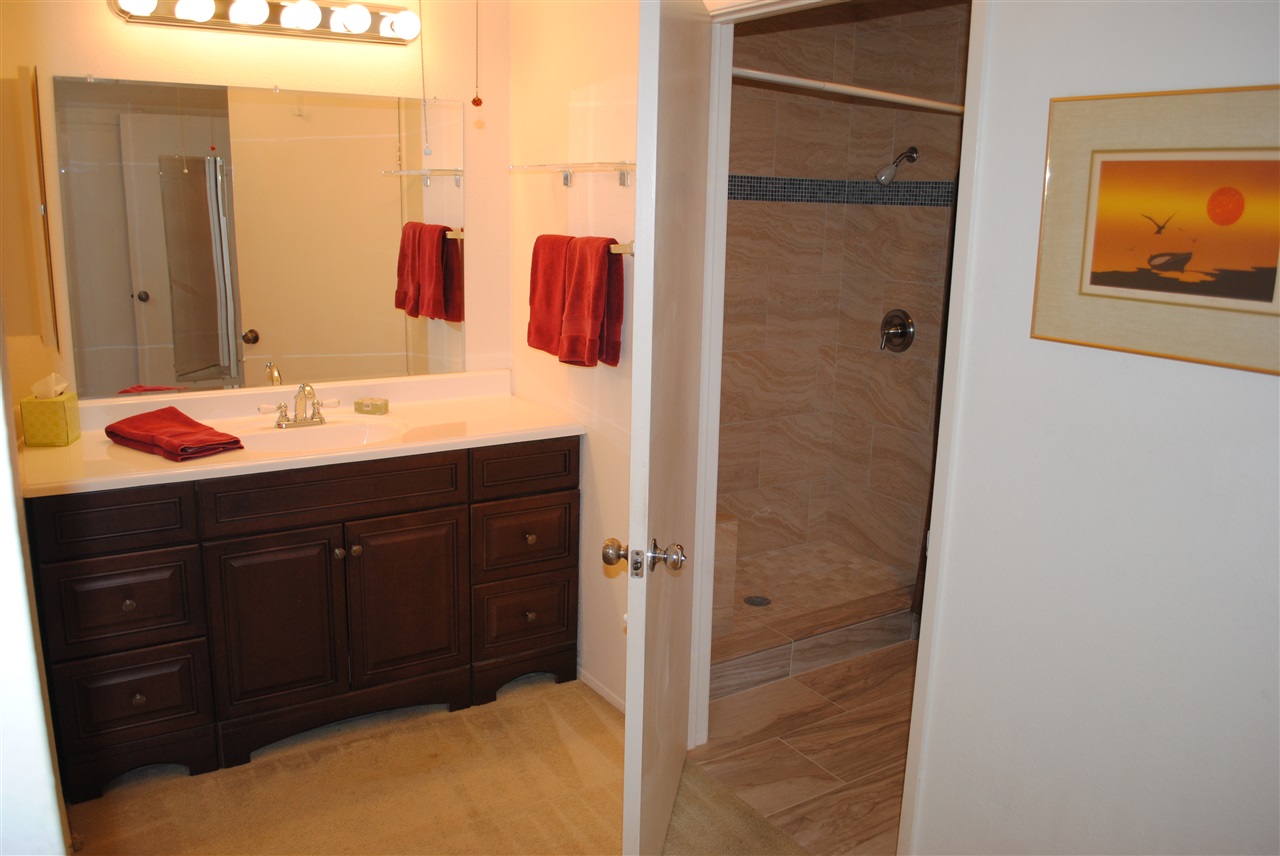 6343 Rancho Mission Road, Unit 2 San Diego, CA 92108 - Photo 9 of 24 View of vanity and shower.