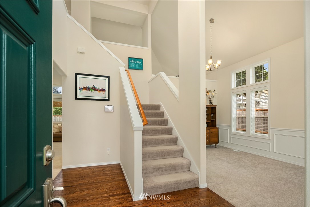 909 Graham Avenue Northeast Renton, WA 98059 - Photo 2 of 32 a view of an entryway with staircase