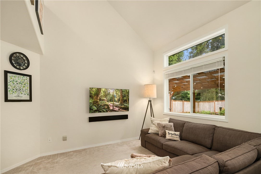 909 Graham Avenue Northeast Renton, WA 98059 - Photo 16 of 32 a living room with furniture and a window