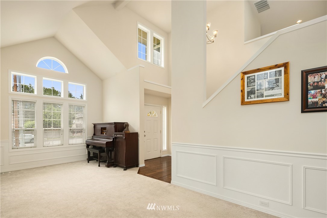 909 Graham Avenue Northeast Renton, WA 98059 - Photo 5 of 32 a view of workspace with furniture and windows
