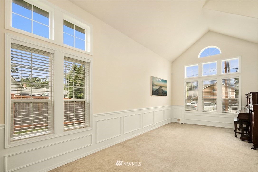 909 Graham Avenue Northeast Renton, WA 98059 - Photo 6 of 32 a view of livingroom with furniture and windows