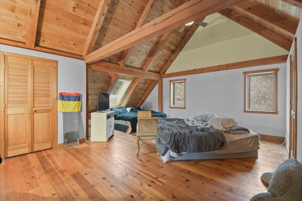 121 Cornwall Hill Road Patterson, NY 12563 - Photo 24 of 37 a living room with furniture and a wooden floor