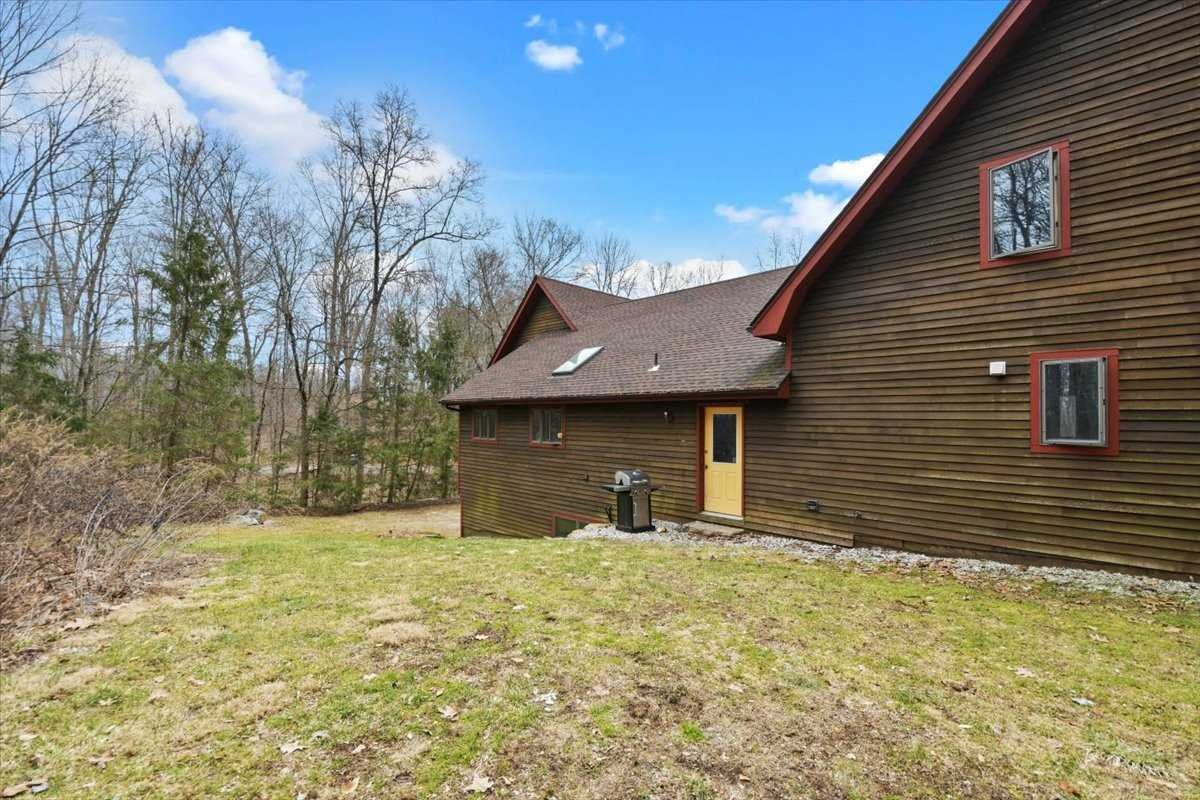 121 Cornwall Hill Road Patterson, NY 12563 - Photo 32 of 37 a front view of a house with a yard