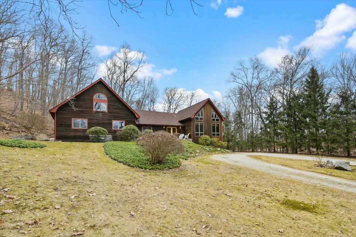 121 Cornwall Hill Road Patterson, NY 12563 - Photo 5 of 37 a front view of a house with a yard