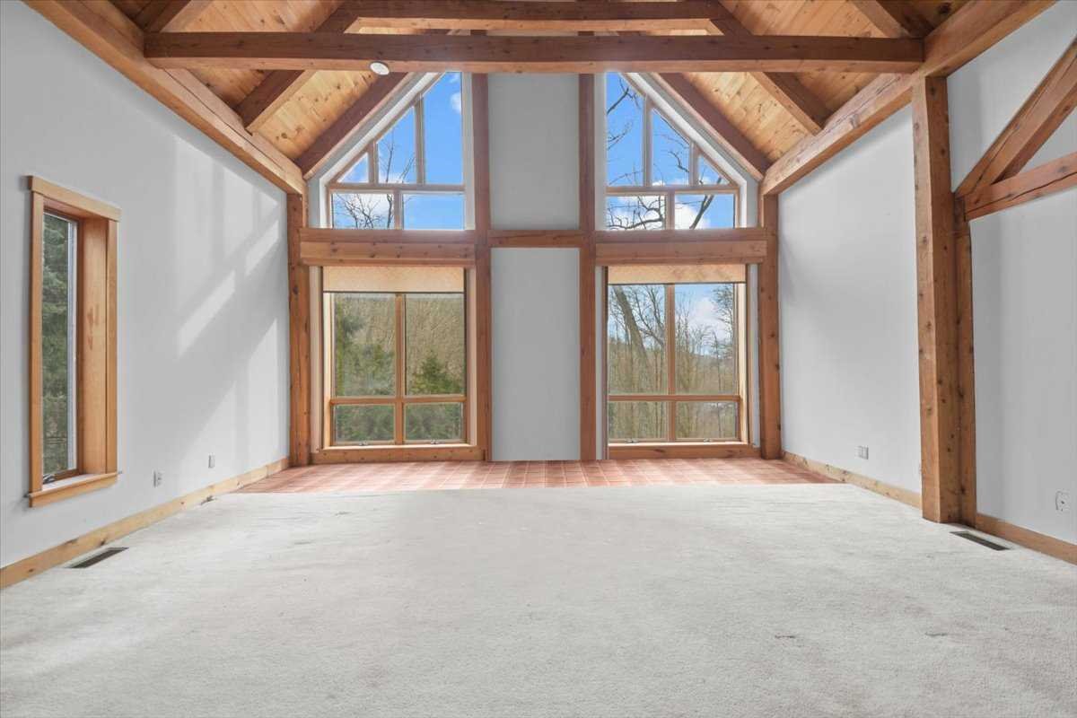 121 Cornwall Hill Road Patterson, NY 12563 - Photo 6 of 37 an empty room with windows