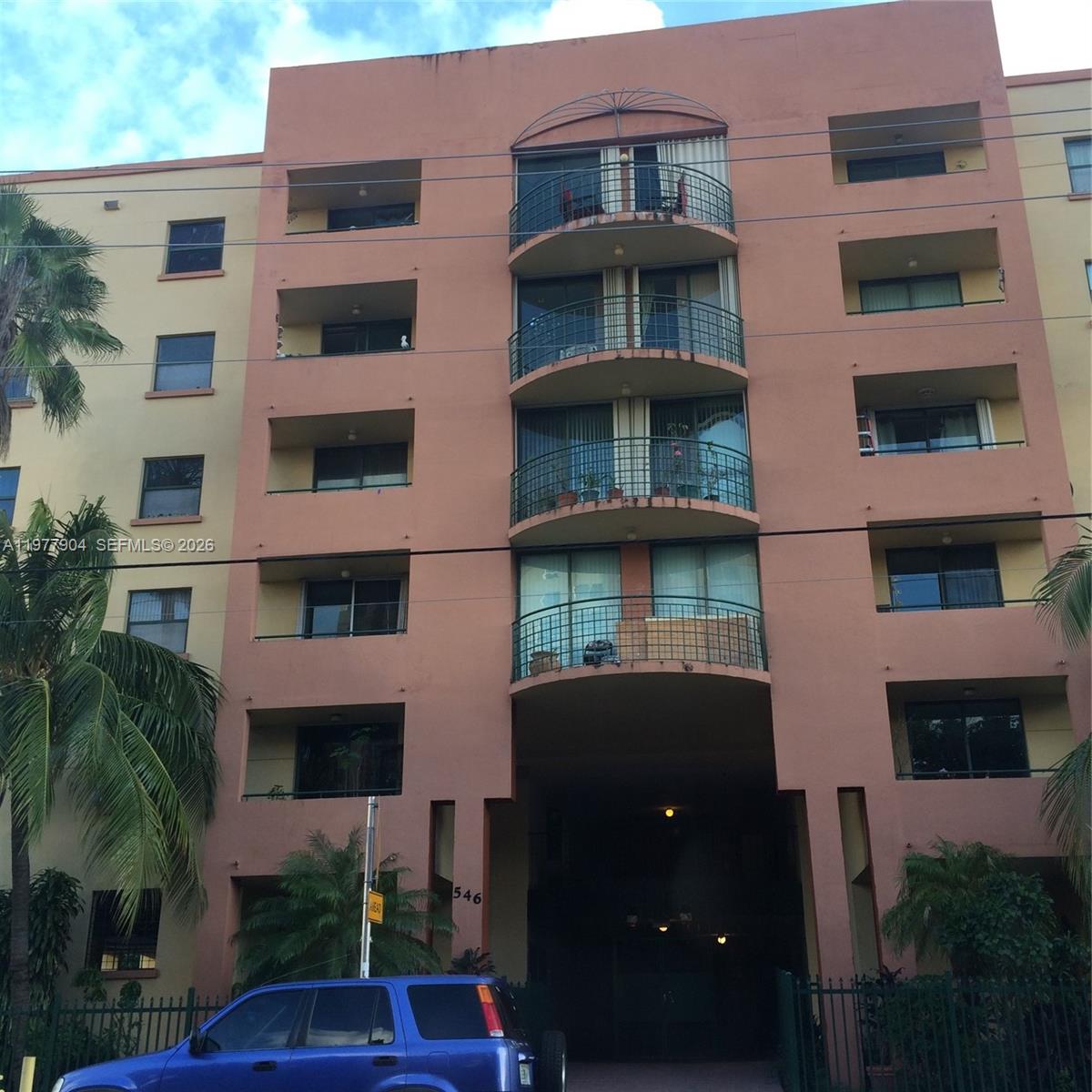 546 Southwest 1st Street, Unit 404 Miami, FL 33130 - Photo 8 of 9 a front view of a multi story building