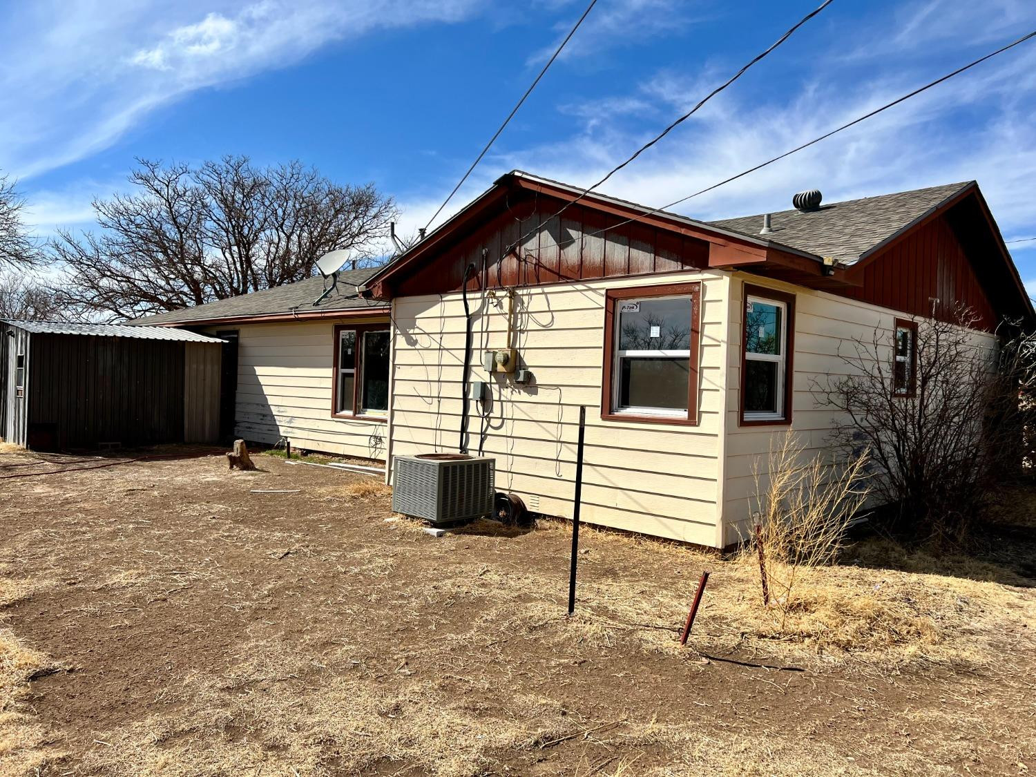 212 12th Street Ralls, TX 79357 - Photo 24 of 24 a front view of a house with a yard