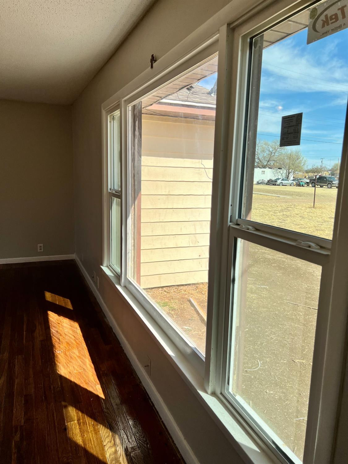 212 12th Street Ralls, TX 79357 - Photo 5 of 24 a view of a windows and an entrance