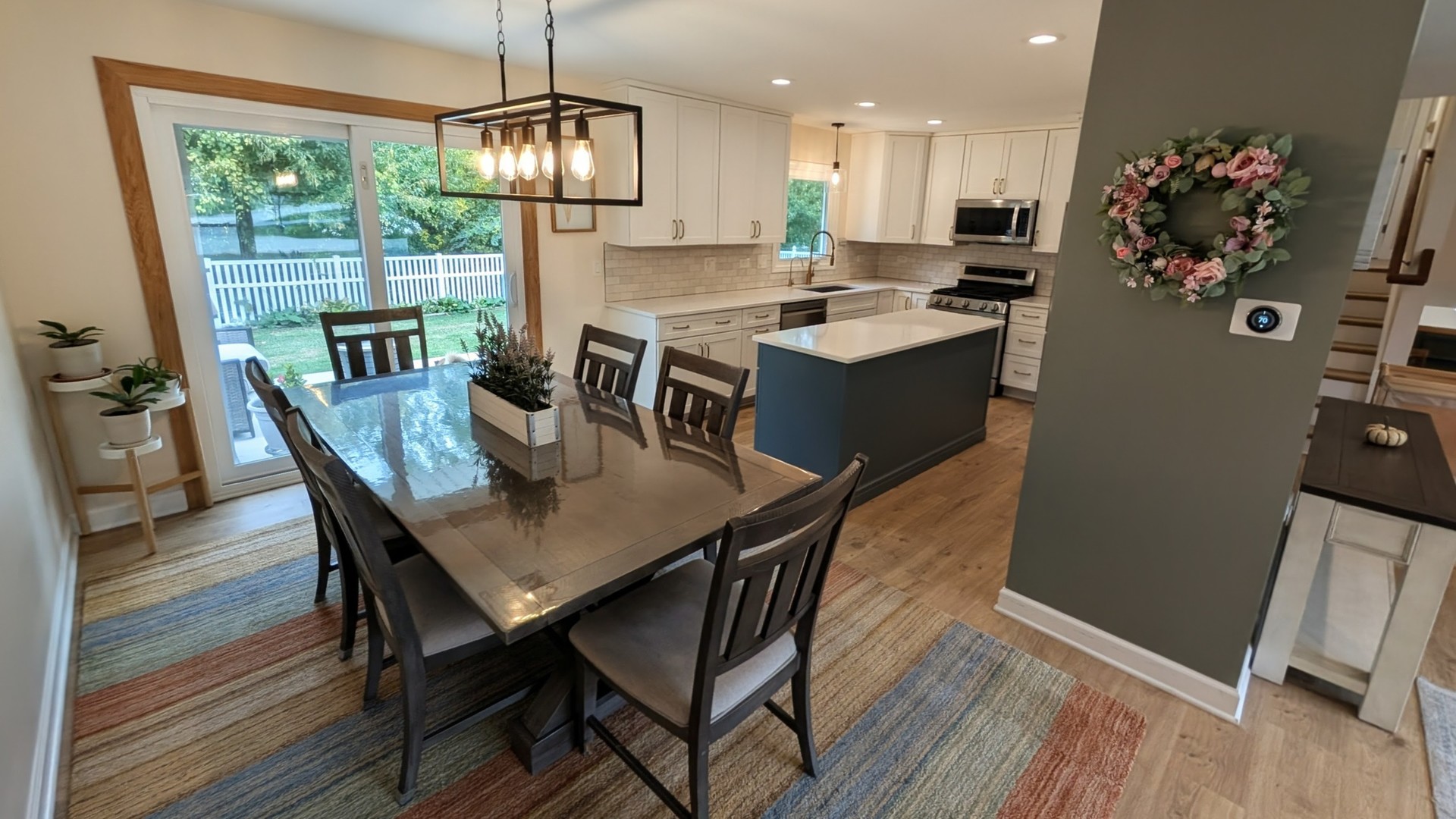 443 Illinois Road Frankfort, IL 60423 - Photo 8 of 19 a view of a dining room with furniture window and wooden floor