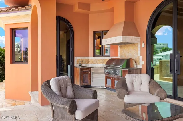 a living room filled with furniture and a fireplace