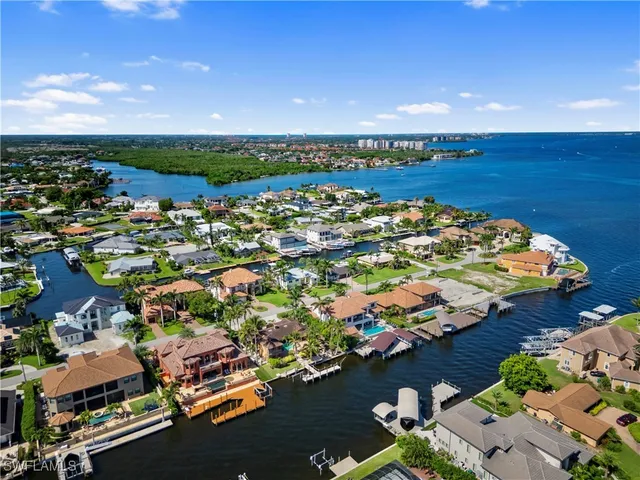 an aerial view of a house with a garden