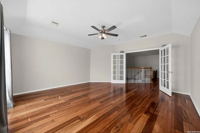 a view of storage and utility room with window