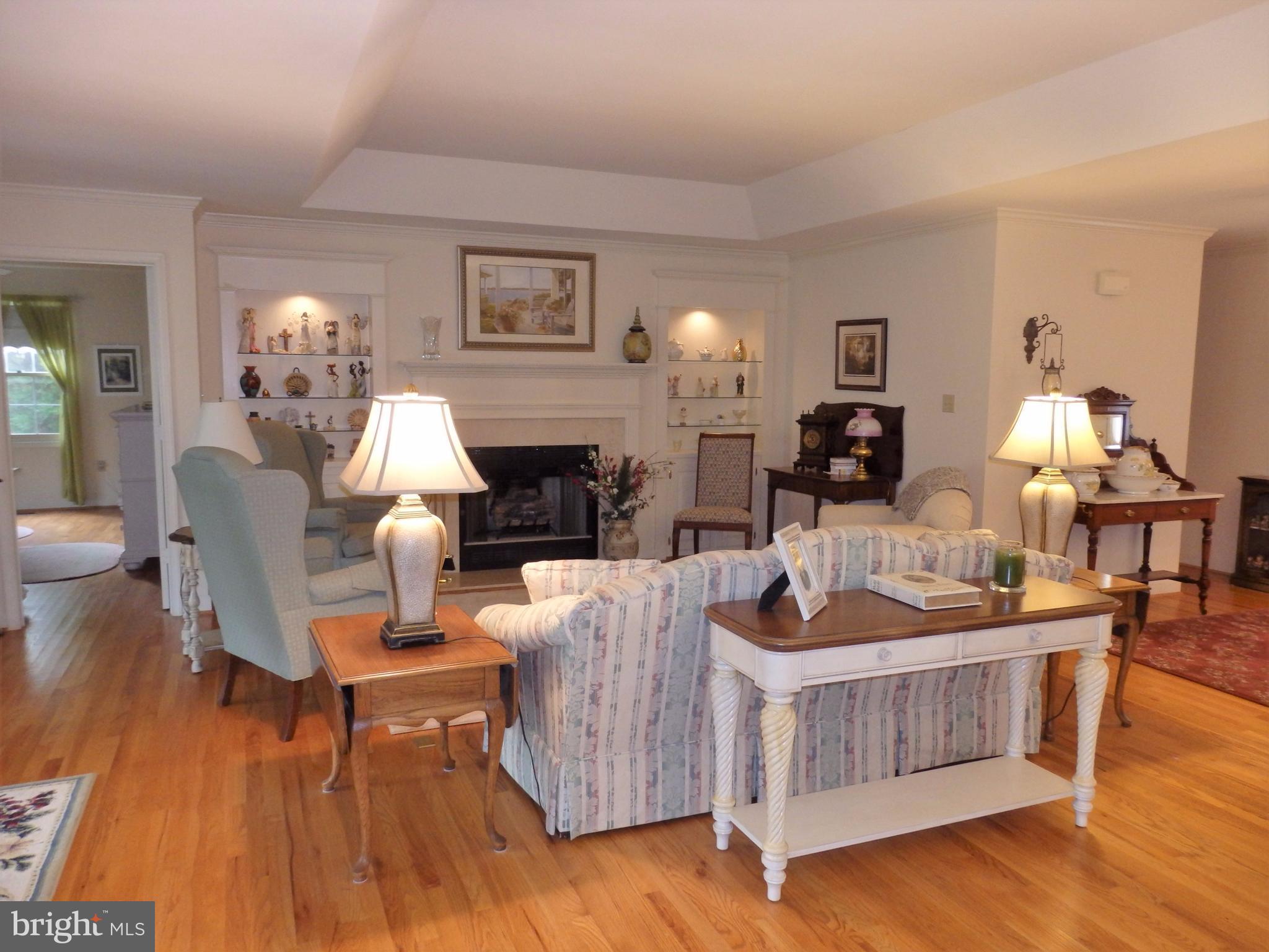 2415 Bear Den Road Frederick, MD 21701 - Photo 3 of 29 a living room with furniture and a wooden floor