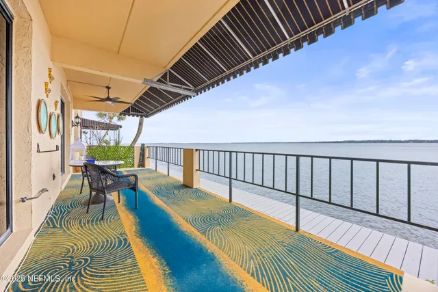 a view of a golf course with a lake