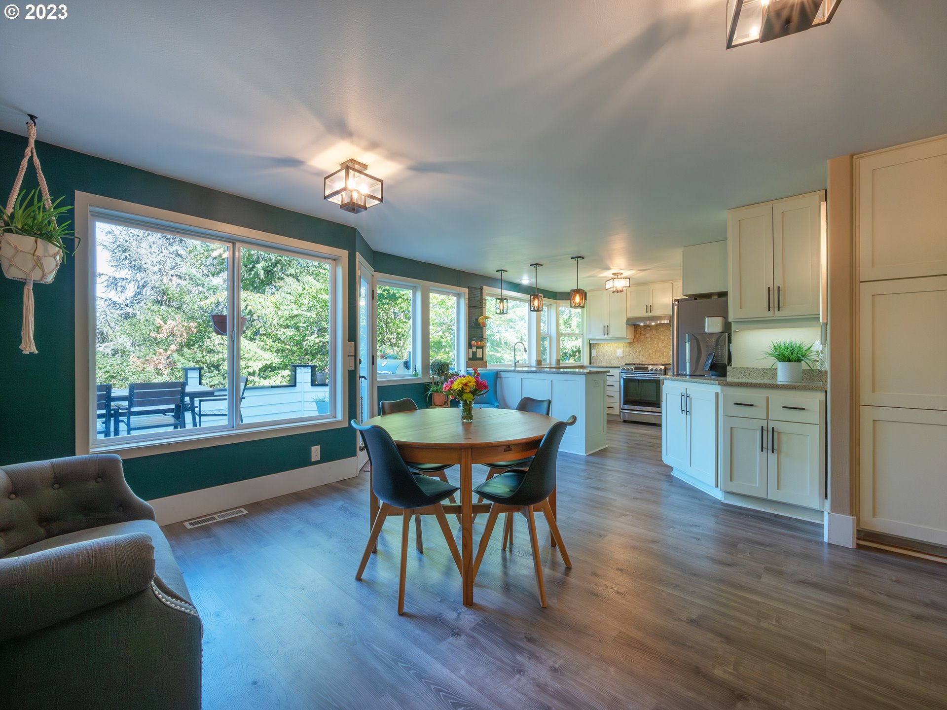 3875 Ashford Drive Eugene, OR 97405 - Photo 18 of 44 a dining room with furniture and wooden floor
