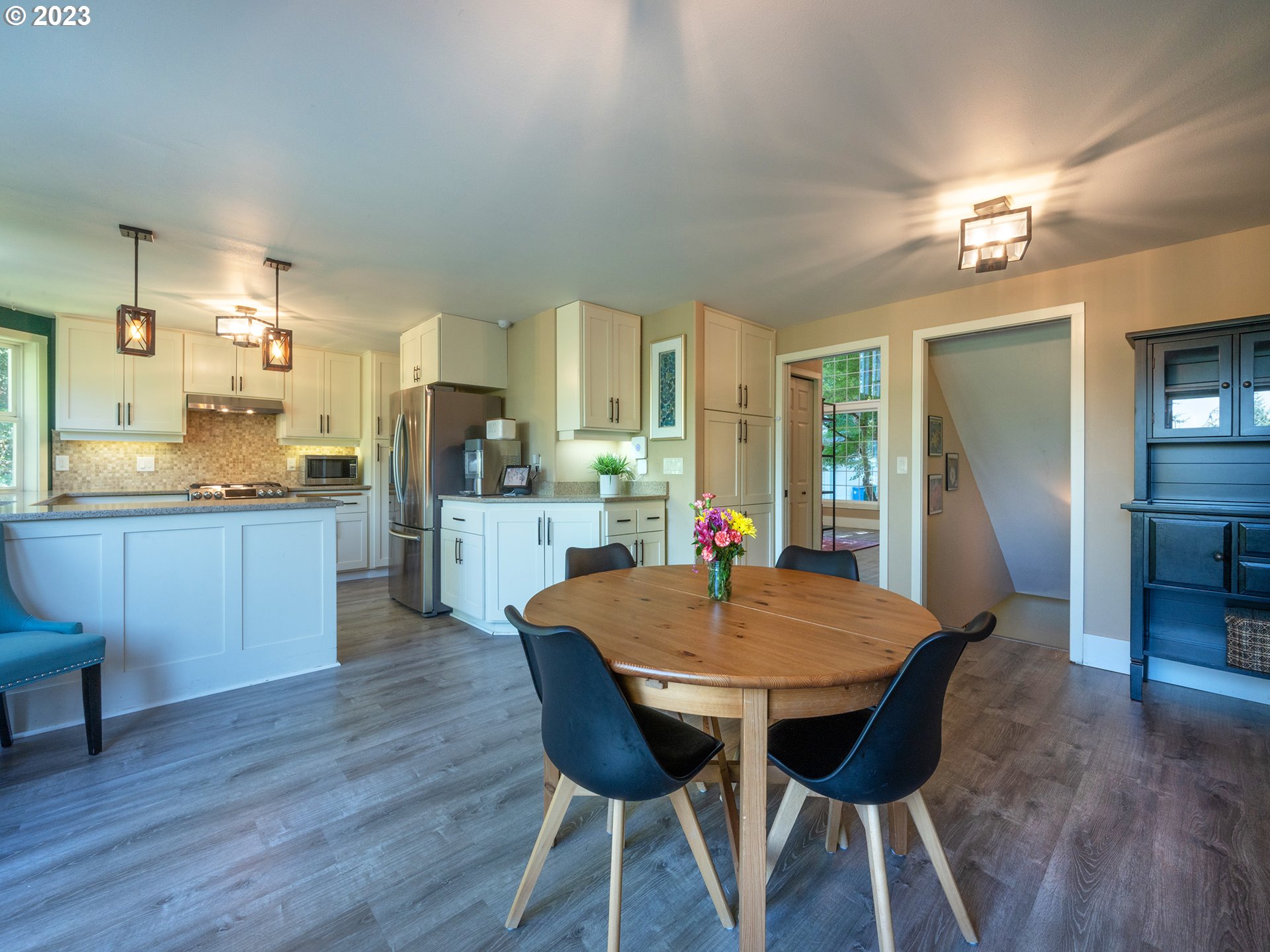 3875 Ashford Drive Eugene, OR 97405 - Photo 19 of 44 a open kitchen with dining table and chairs