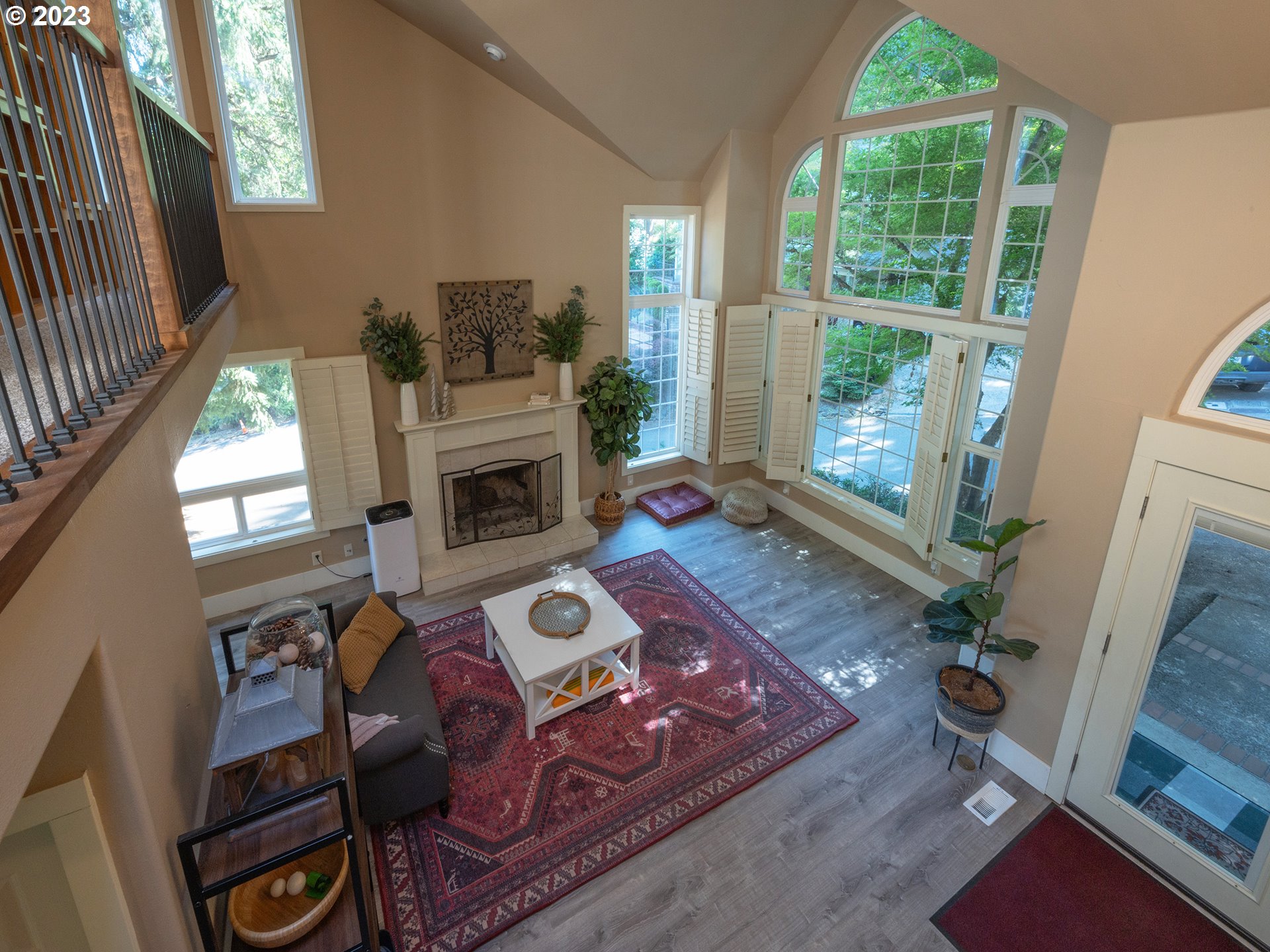 3875 Ashford Drive Eugene, OR 97405 - Photo 22 of 44 a living room with furniture and a fireplace
