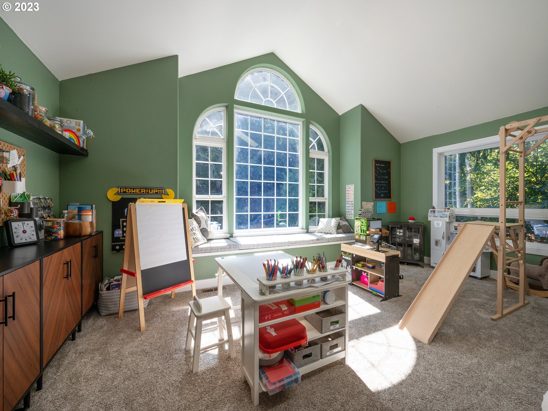 3875 Ashford Drive Eugene, OR 97405 - Photo 27 of 44 a bedroom with furniture and a large window