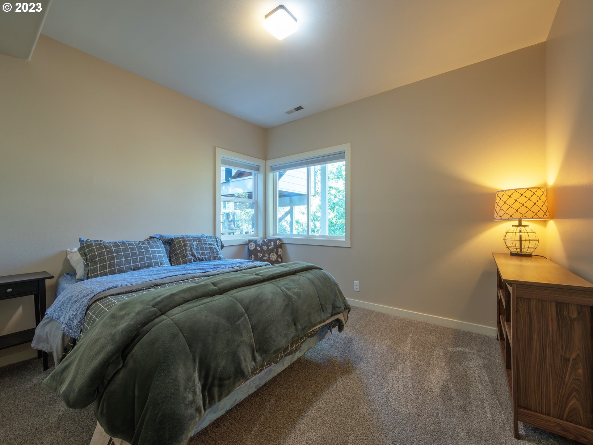 3875 Ashford Drive Eugene, OR 97405 - Photo 31 of 44 a bedroom with a bed and a window