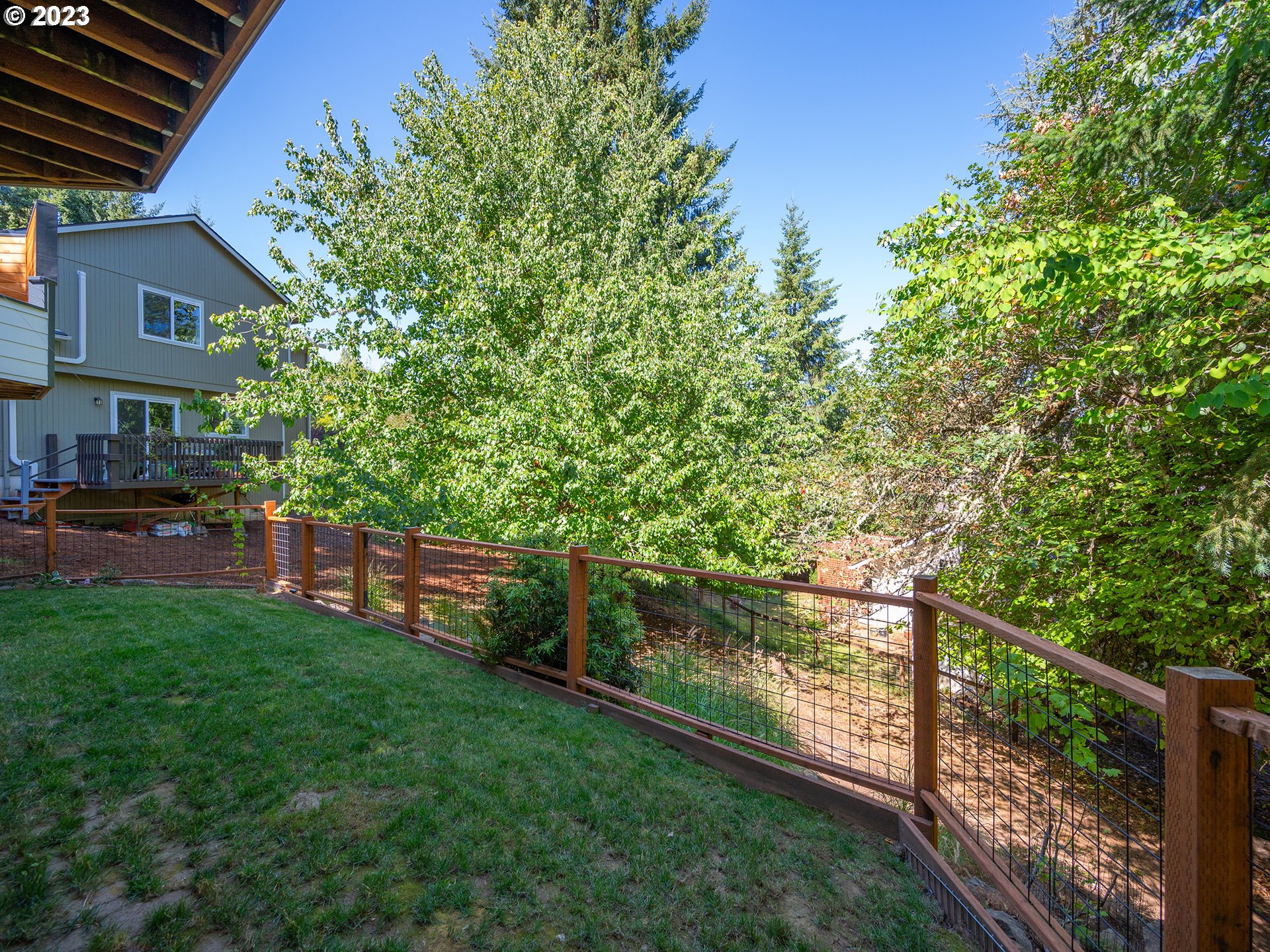 3875 Ashford Drive Eugene, OR 97405 - Photo 38 of 44 a view of a yard with a house in the background