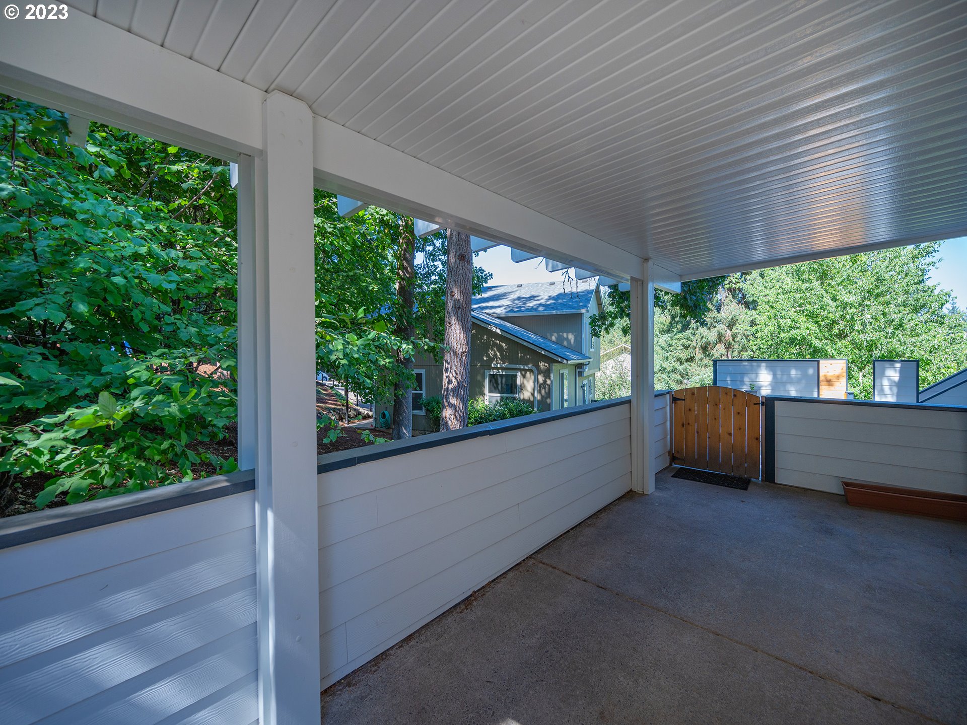 3875 Ashford Drive Eugene, OR 97405 - Photo 43 of 44 a view of a porch with furniture and garden