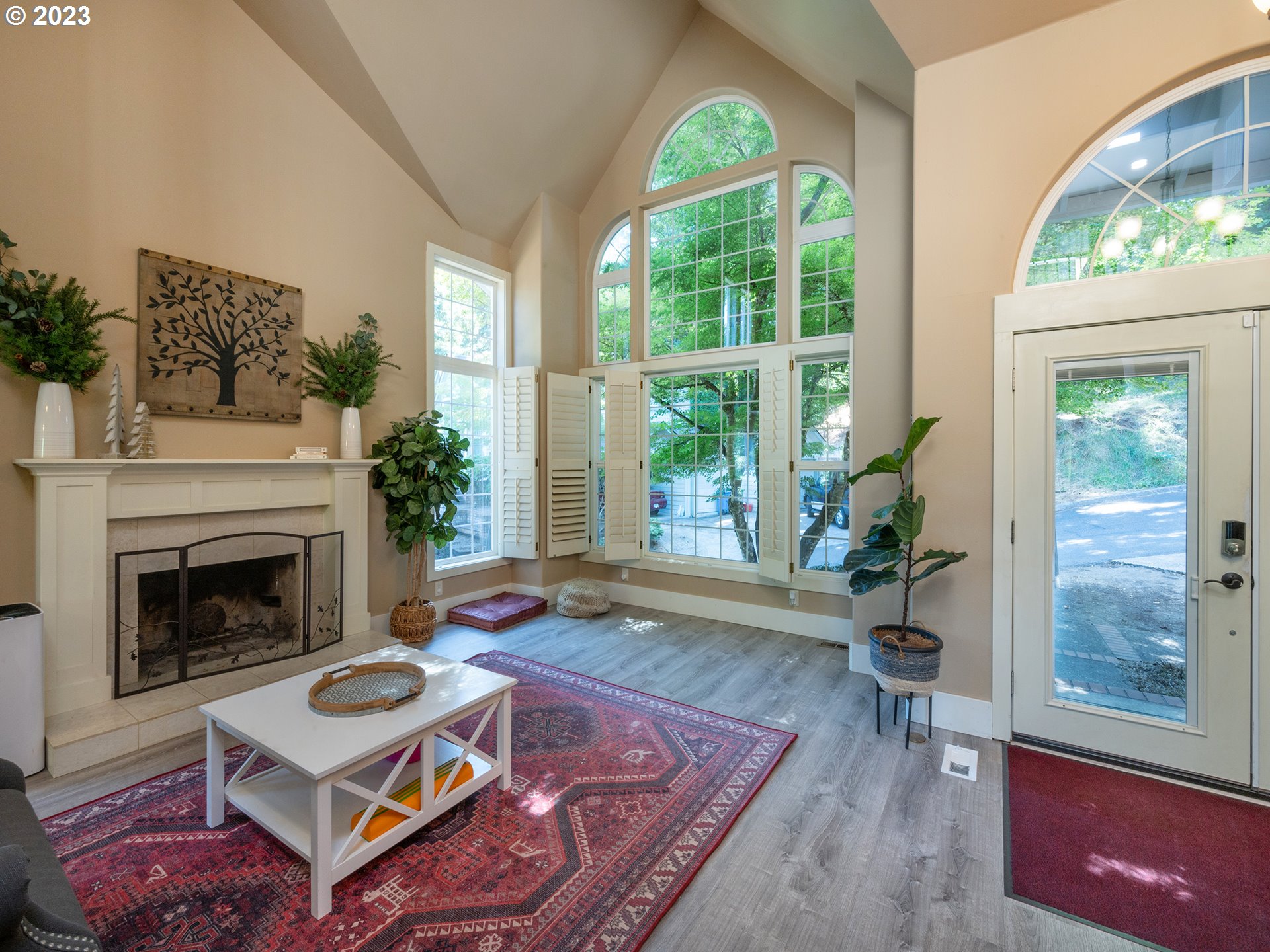3875 Ashford Drive Eugene, OR 97405 - Photo 5 of 44 a living room with furniture and a fireplace