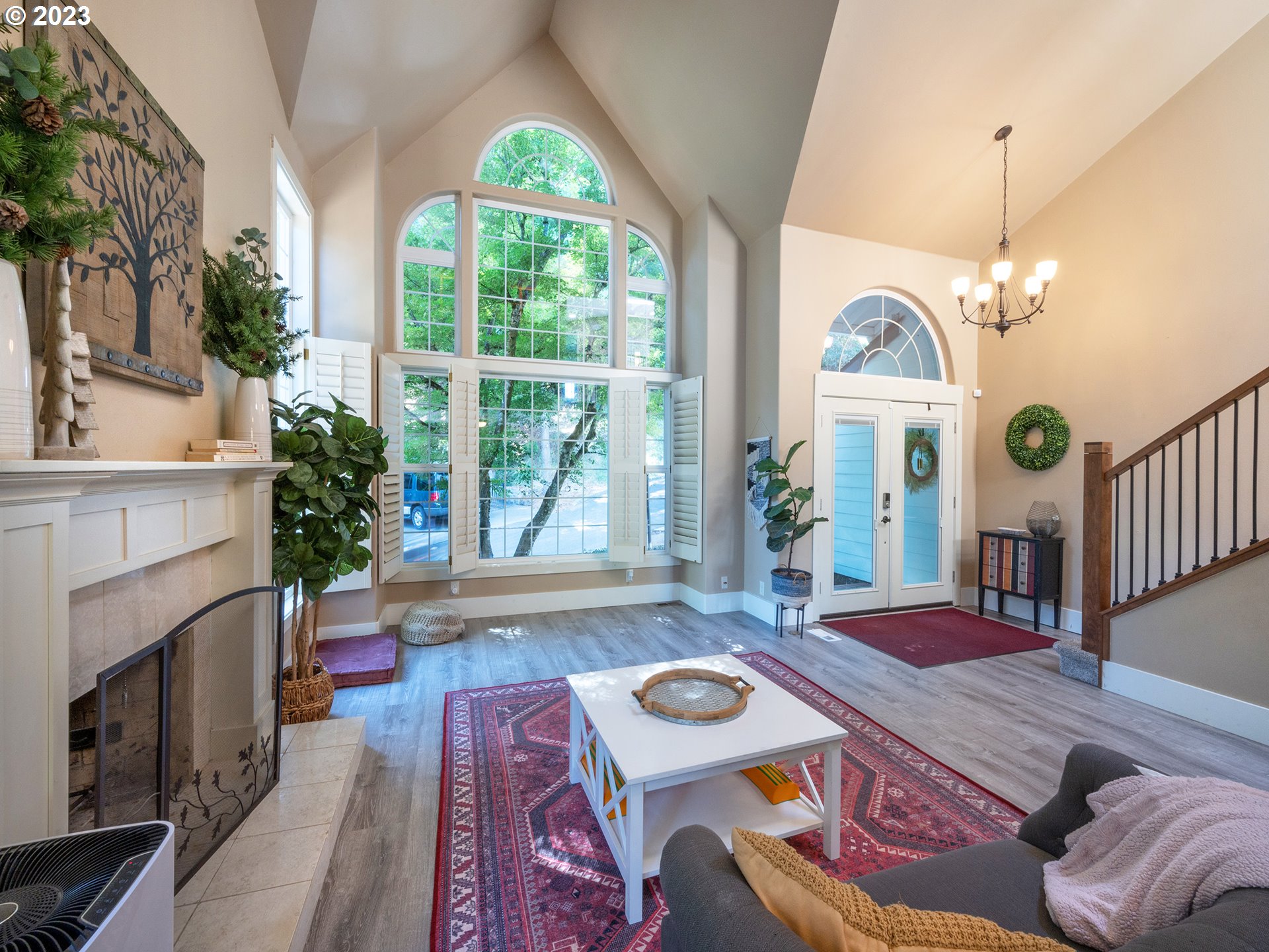 3875 Ashford Drive Eugene, OR 97405 - Photo 9 of 44 a view of a livingroom with furniture window and wooden floor