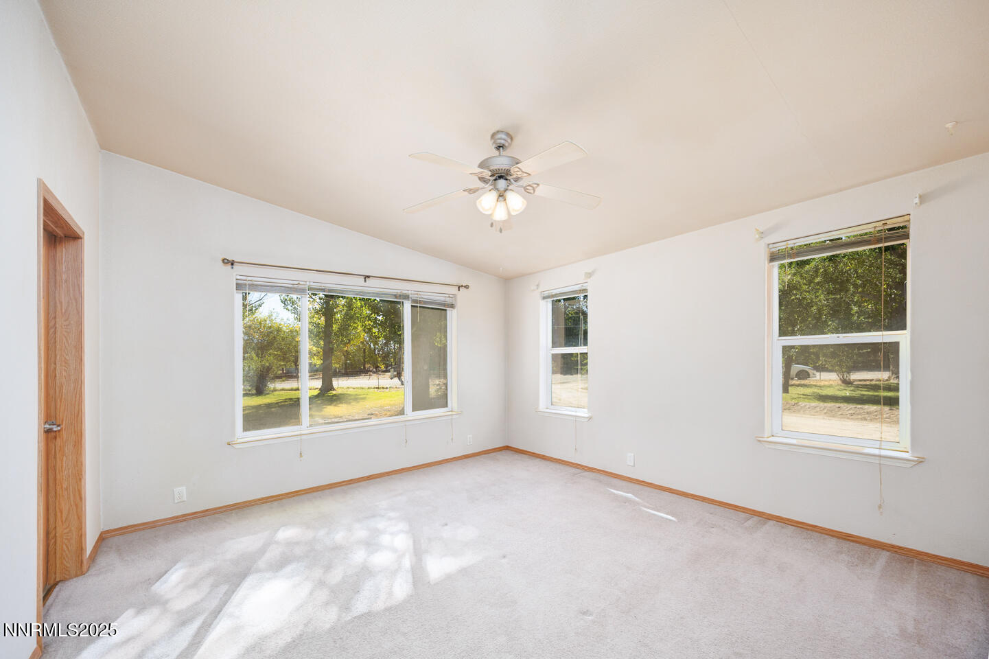 1480 River View Drive Fallon, NV 89406 - Photo 13 of 32 an empty room with windows and ceiling fan