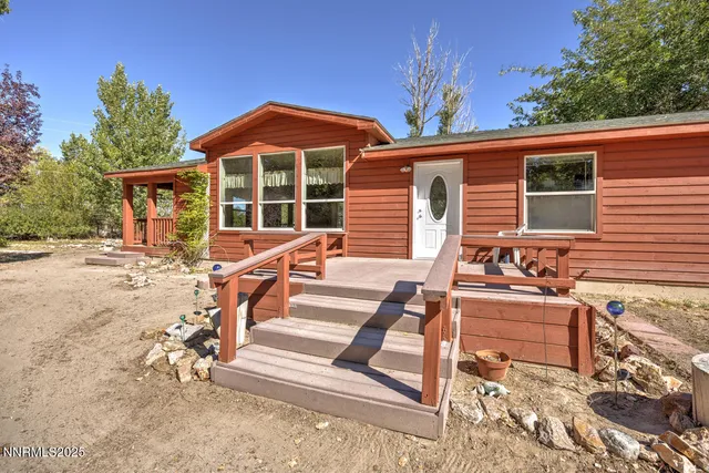 a view of a house with a patio