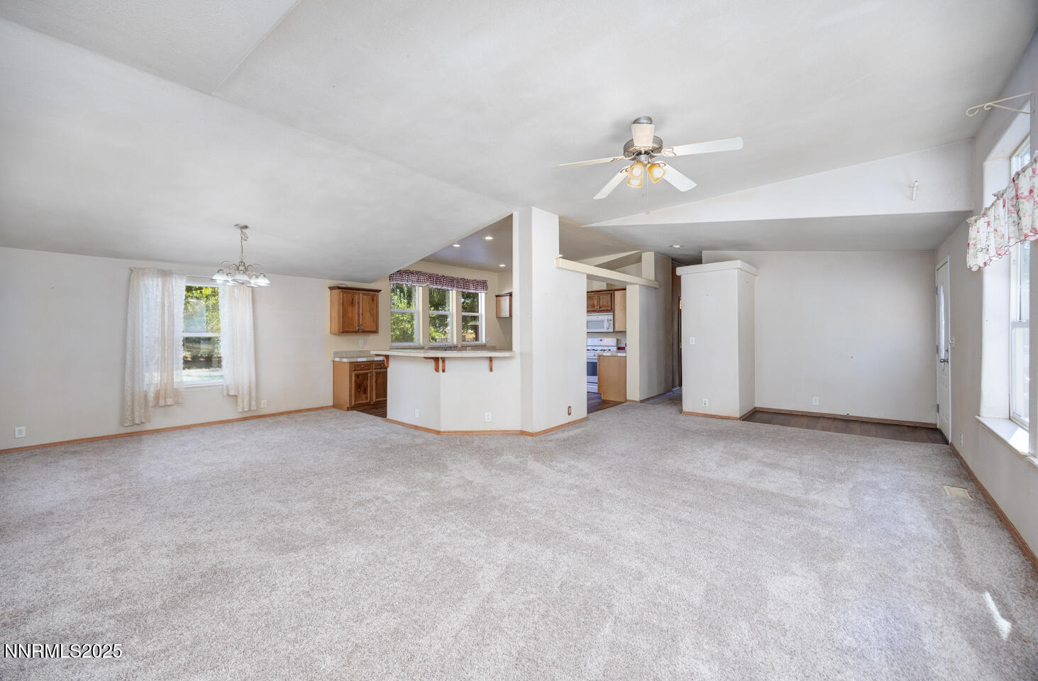 1480 River View Drive Fallon, NV 89406 - Photo 4 of 32 an empty room with windows and cabinet