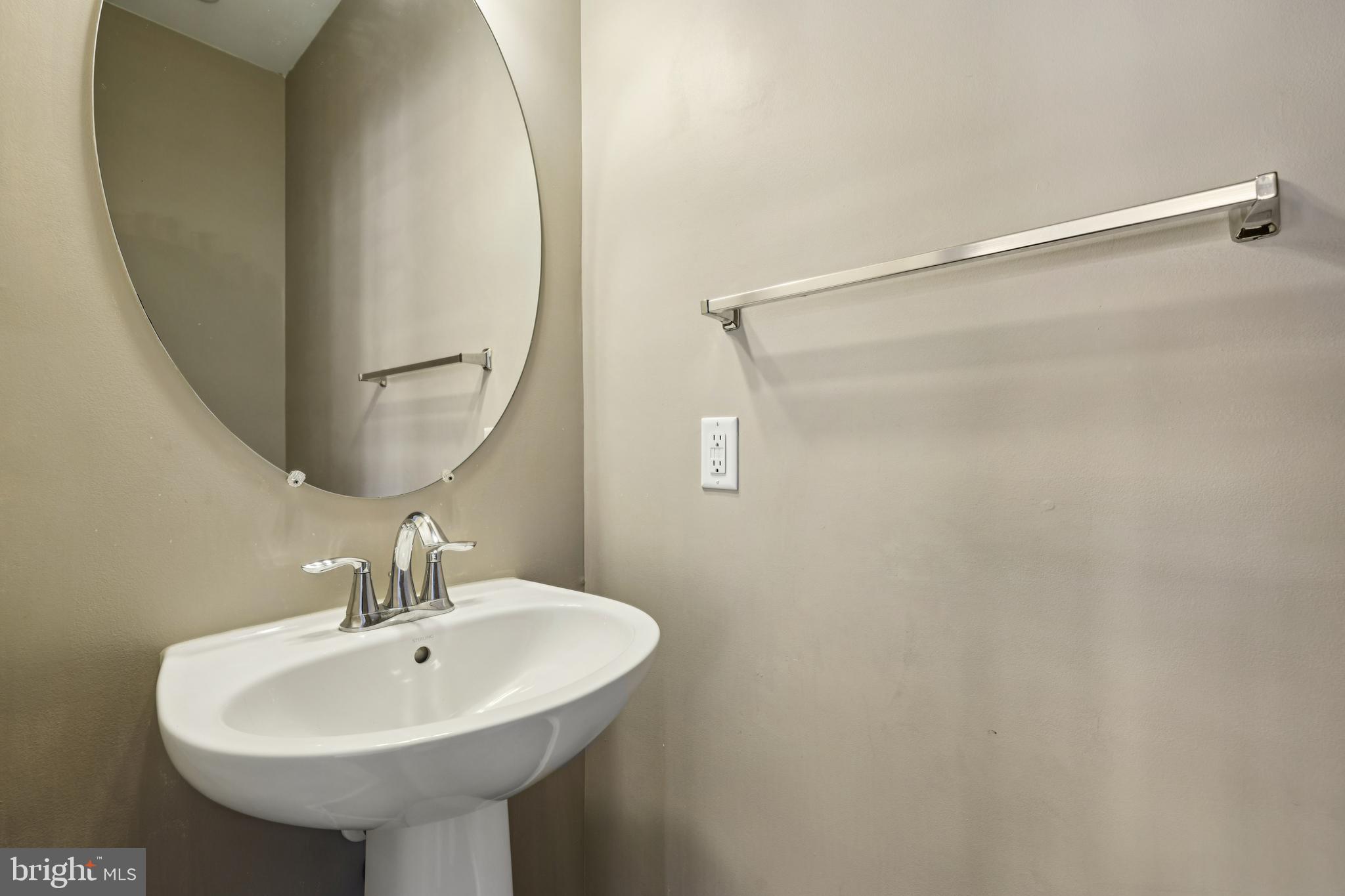 5841 Bella Marie Way Frederick, MD 21703 - Photo 16 of 45 a bathroom with a sink and a mirror
