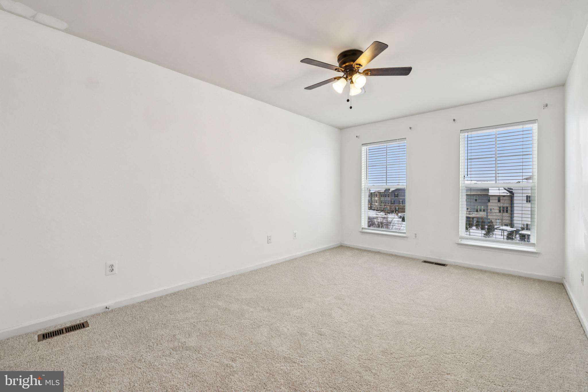 5841 Bella Marie Way Frederick, MD 21703 - Photo 17 of 45 a view of an empty room with a window