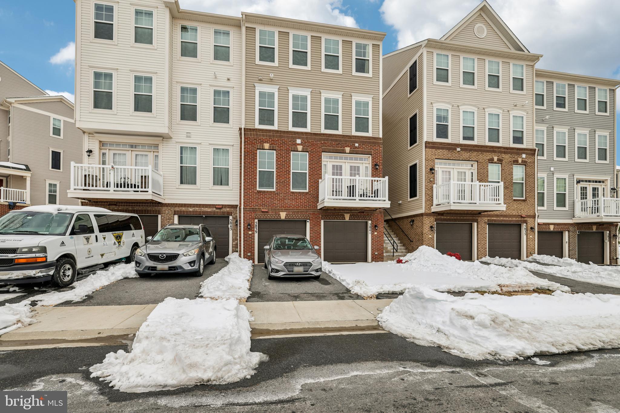5841 Bella Marie Way Frederick, MD 21703 - Photo 2 of 45 a view of a car park in front of building