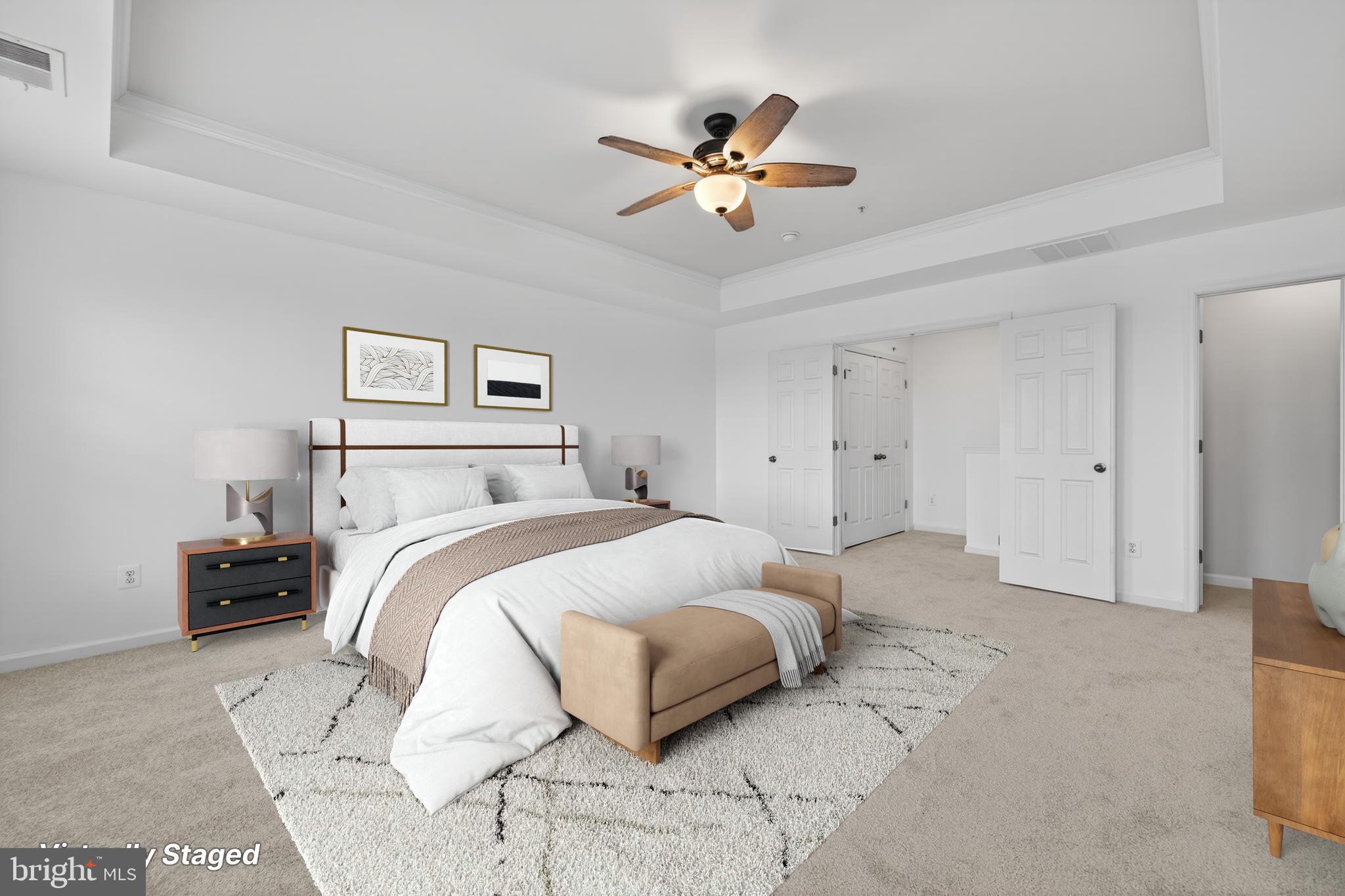 5841 Bella Marie Way Frederick, MD 21703 - Photo 22 of 45 a bedroom with a bed and a chandelier