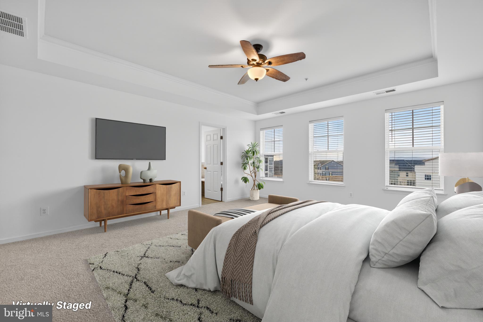 5841 Bella Marie Way Frederick, MD 21703 - Photo 24 of 45 a spacious bedroom with a bed and window