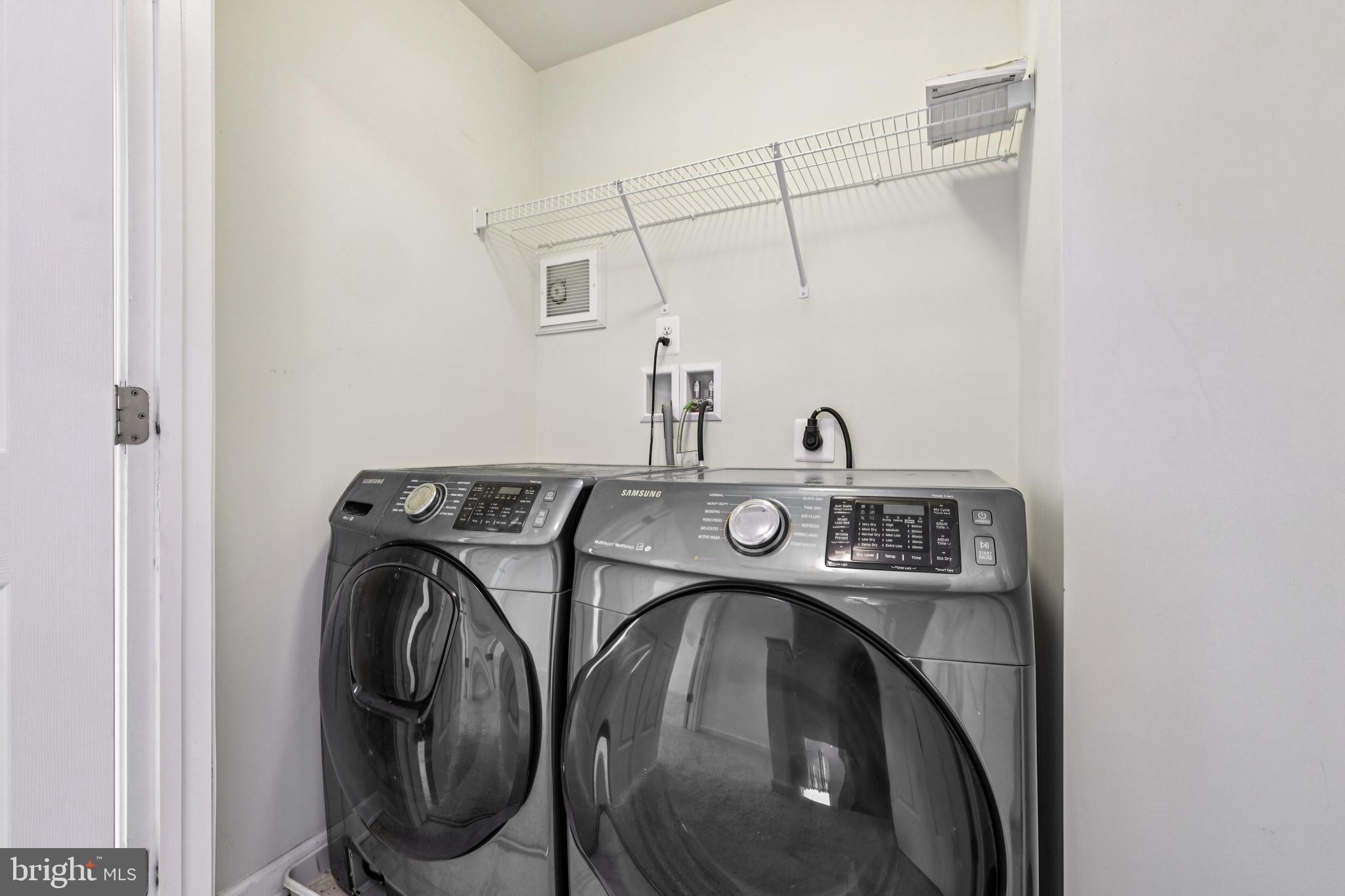 5841 Bella Marie Way Frederick, MD 21703 - Photo 29 of 45 a utility room with dryer and washer