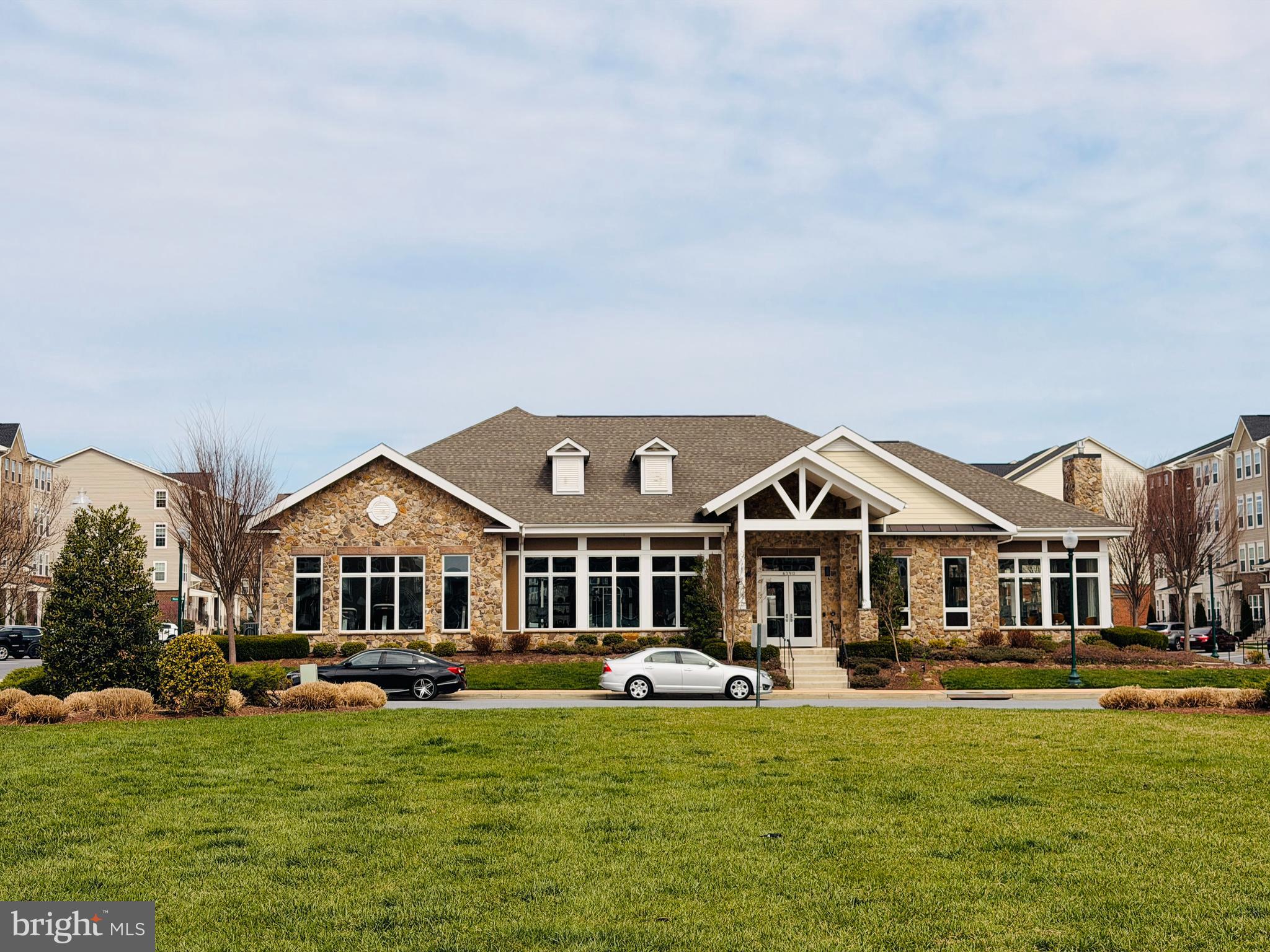 5841 Bella Marie Way Frederick, MD 21703 - Photo 43 of 45 a front view of a house with a garden