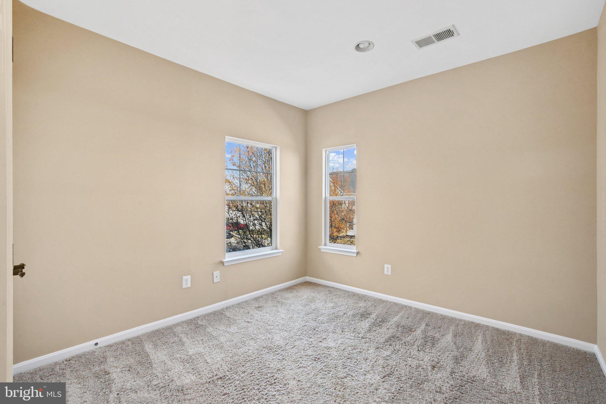 302 Appleby School Road Cambridge, MD 21613 - Photo 14 of 28 a view of an empty room with a window