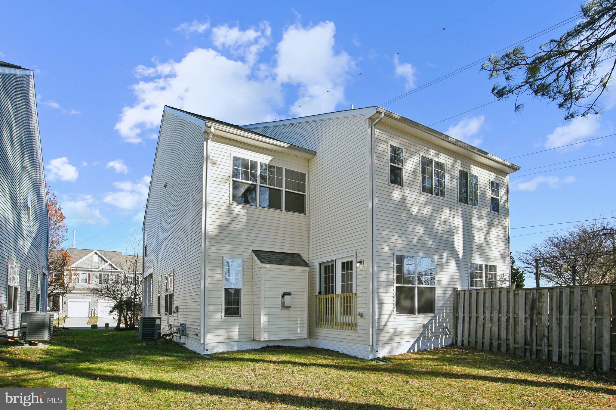 302 Appleby School Road Cambridge, MD 21613 - Photo 25 of 28 a front view of a house with a yard