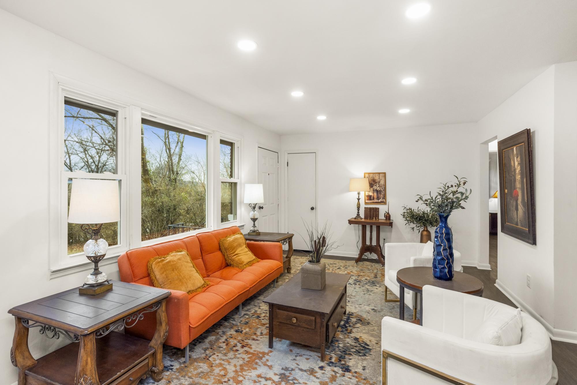 306 Kemper Drive South Madison, TN 37115 - Photo 13 of 42 a living room with furniture a flat screen tv and a window