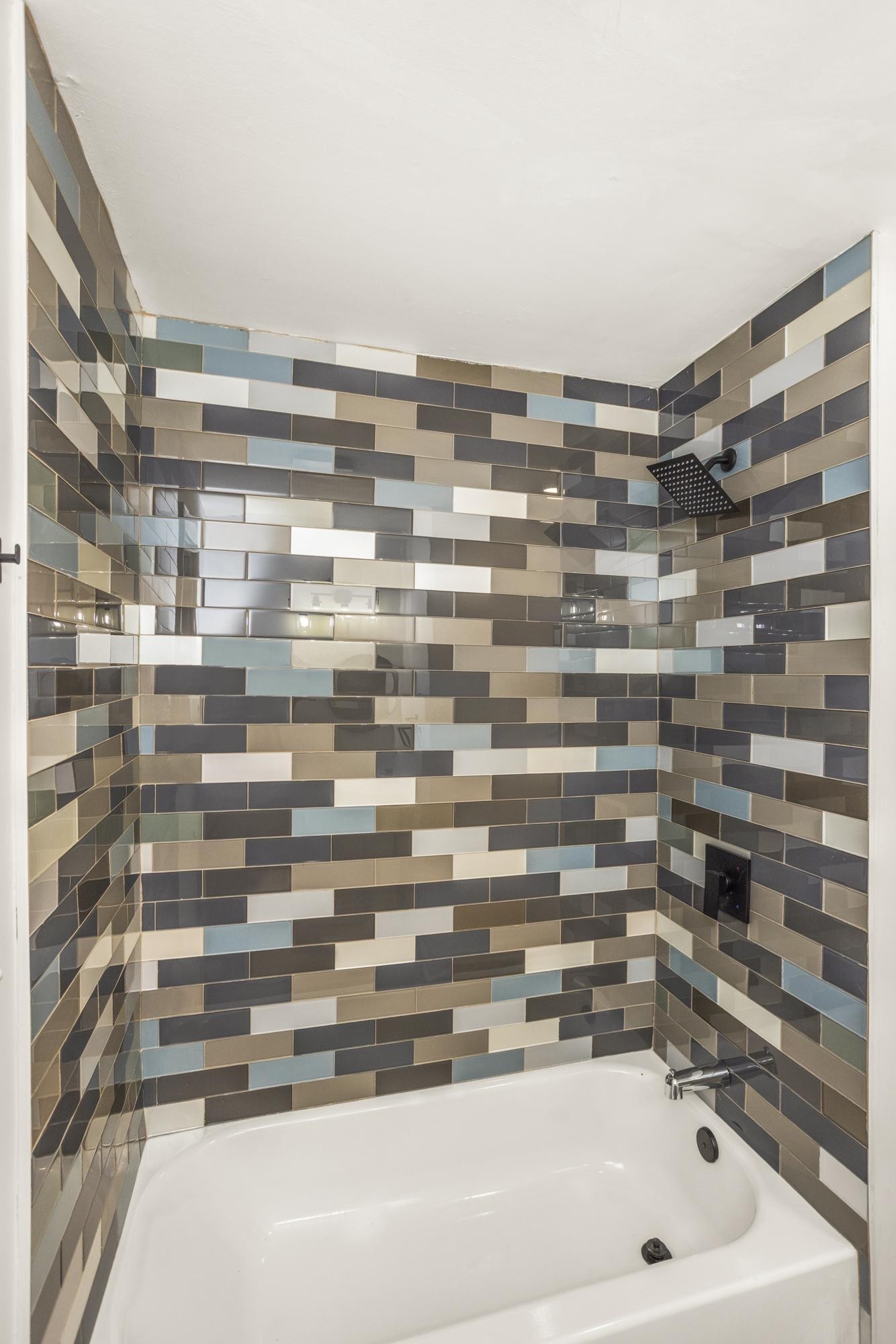 306 Kemper Drive South Madison, TN 37115 - Photo 24 of 42 a bathroom with a bathtub and a shower