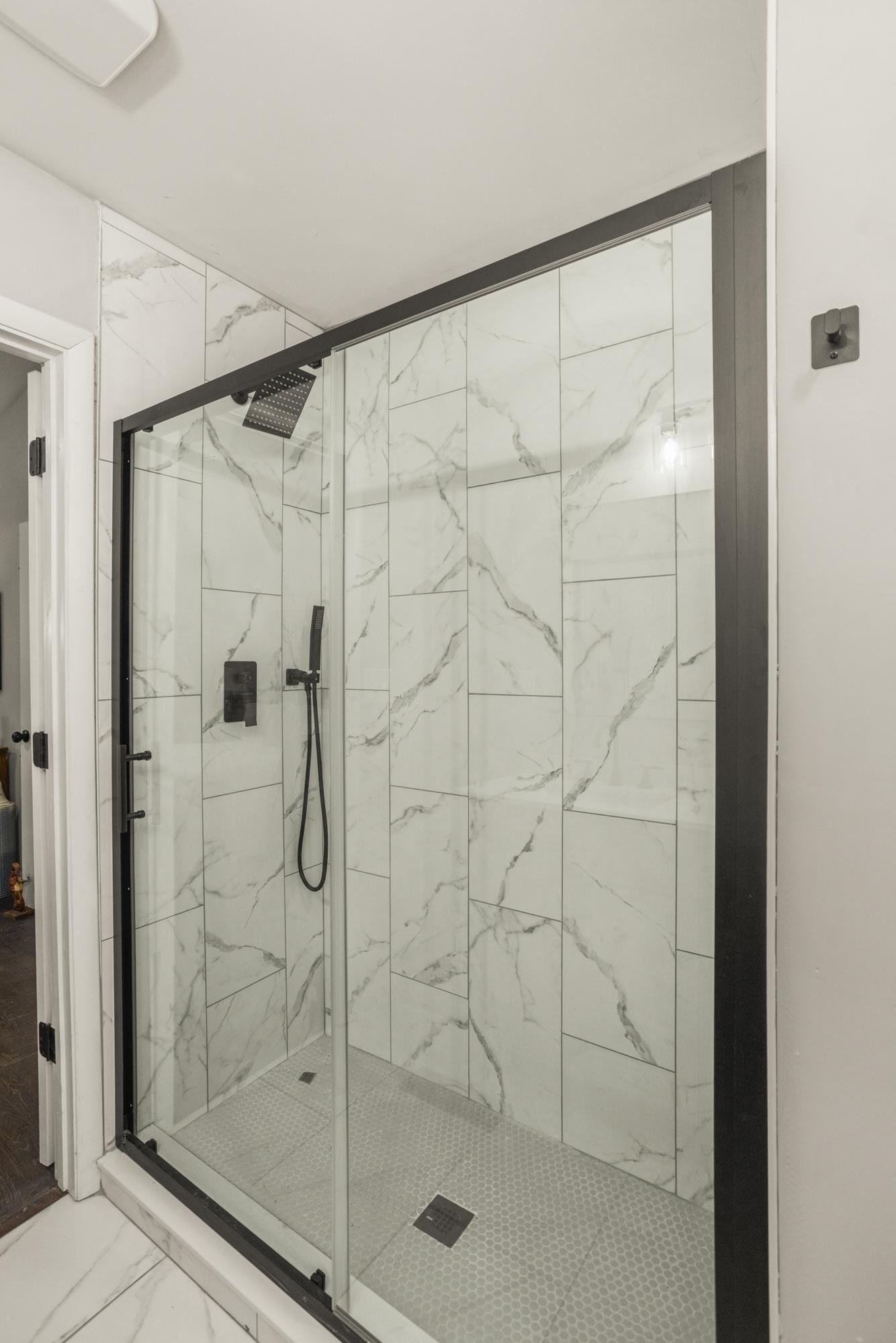 306 Kemper Drive South Madison, TN 37115 - Photo 34 of 42 a bathroom with a glass shower door