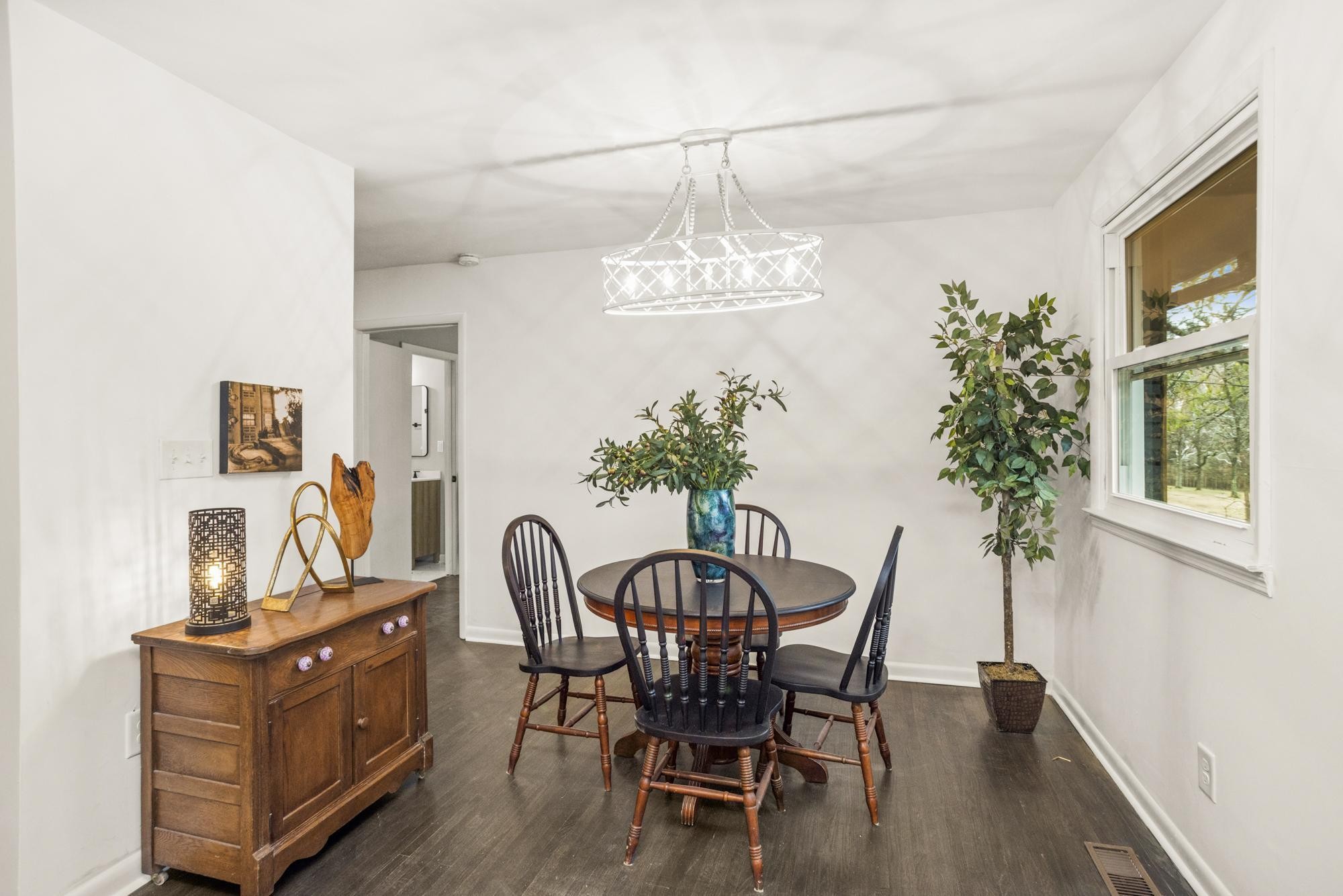 306 Kemper Drive South Madison, TN 37115 - Photo 5 of 42 a view of a dining room with furniture and chandelier