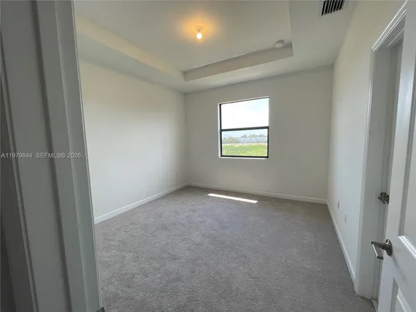 an empty room with an entryway
