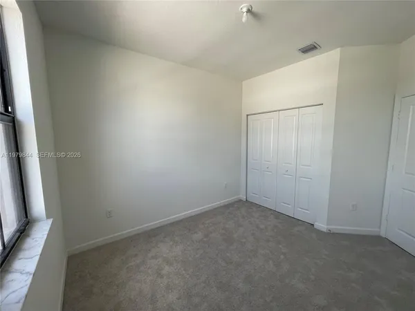an empty room with closet